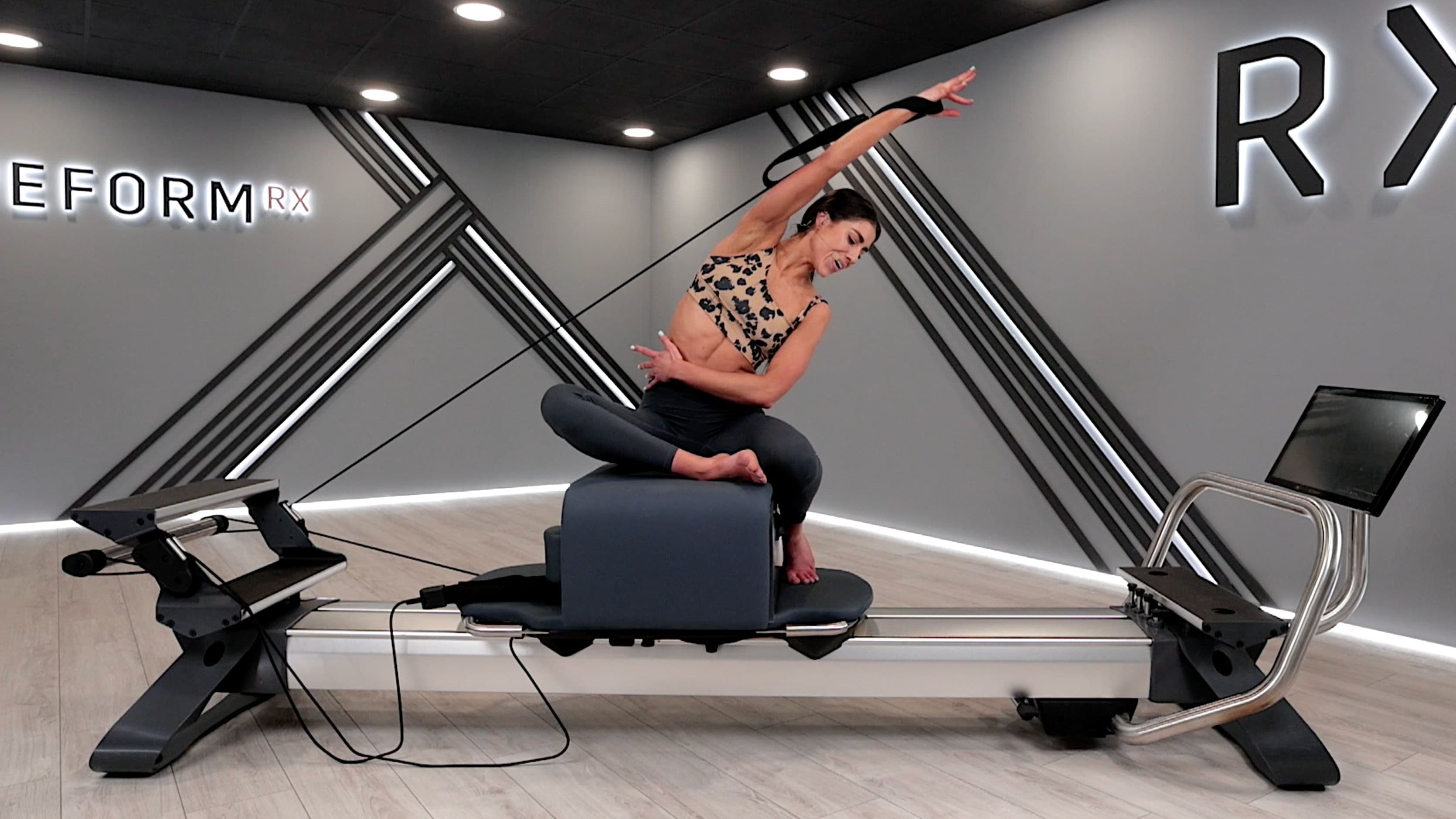 Cozy cardio pilates workout on a reformer with iFIT Trainer Natalie during Reform Flow